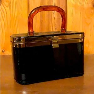 Vintage purse with pattern lining and cool handle